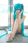 aqua_hair bikini cosplay hair_ribbons hatsune_miku headset swimsuit twintails utateika-na vocaloid rating:Safe score:4 user:pixymisa