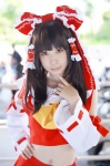 blouse cosplay detached_sleeves hairbow hakurei_reimu miko skirt touhou you_(ii) rating:Safe score:1 user:nil!