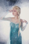 blonde_hair blue_eyes cosplay dress elsa frozen tomiaaaaaaa rating:Safe score:0 user:DarkSSA