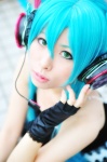 blue_hair cosplay hatsune_miku magnet_(vocaloid) momose_riyu twintails vocaloid rating:Safe score:1 user:Log