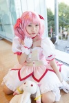 bows choker cosplay dress gloves hairbow kaname_madoka kneehighs kujyou_konegi pink_hair plushie puella_magi_madoka_magica red_eyes tiered_skirt twintails rating:Safe score:0 user:pixymisa