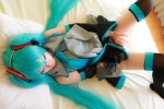 aqua_hair arai_yomi bed blouse cosplay detached_sleeves hatsune_miku headset panties pleated_skirt skirt thighhighs tie twintails vocaloid rating:Questionable score:1 user:nil!