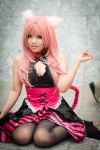 animal_ears black_legwear chain cleavage collar cosplay dress megurine_luka pantyhose pink_hair ravi tail vocaloid rating:Safe score:2 user:pixymisa