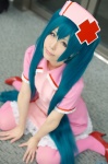 aqua_hair cosplay dress haruka hatsune_miku koiiro_byoutou_(vocaloid) nurse nurse_cap nurse_uniform thighhighs twintails vocaloid rating:Safe score:0 user:nil!