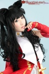 cosplay detached_sleeves dress fate/series fate/stay_night fingerless_gloves gloves hair_ribbons red_devil saku tohsaka_rin twintails rating:Safe score:0 user:nil!