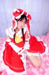 cosplay hairbow hakurei_reimu hanausagi_manyu jumper miko socks touhou rating:Safe score:0 user:LittleSweetLoli