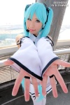 aqua_hair cosplay detached_sleeves hair_ribbons hatsune_miku microphone nei project_diva twintails vocaloid rating:Safe score:0 user:pixymisa