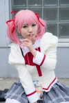 blouse bowtie cosplay hair_ribbons kaname_madoka kawabe_yuki pink_eyes pink_hair pleated_skirt puella_magi_madoka_magica skirt thighhighs twintails rating:Safe score:0 user:pixymisa