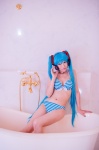 aqua_hair bathroom bathtub bikini cleavage cosplay hatsune_miku headset mashiro_yuki project_diva swimsuit twintails vocaloid rating:Safe score:0 user:nil!