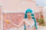 ageha aqua_hair bikini_top cosplay hairbows hatsune_miku sakura_mai_yuki_midori swimsuit twintails vocaloid rating:Safe score:1 user:nil!