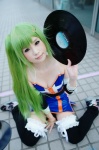beatmania_iidx camisole cleavage cosplay croptop erika_(beatmania) green_hair hair_clips leggings miniskirt shirayuki_himeno side_ponytail skirt rating:Safe score:1 user:nil!
