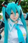 aice aqua_hair cosplay default_costume detached_sleeves hatsune_miku headset tie twintails vocaloid rating:Safe score:0 user:nil!