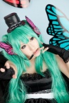 aqua_hair cosplay dress fingerless_gloves gloves hatsune_miku headset magnet_(vocaloid) saku top_hat twintails vocaloid rating:Safe score:0 user:nil!