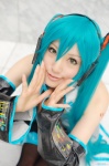 aqua_hair cosplay default_costume detached_sleeves hatsune_miku headset pleated_skirt saya skirt thighhighs tie twintails vocaloid rating:Safe score:1 user:nil!
