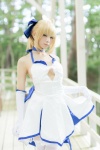 ahoge blonde_hair choker cleavage cosplay dress dress_lift elbow_gloves fate/series fate/stay_night forest_(photoset) gloves hairbow saber thighhighs usakichi white_legwear rating:Safe score:1 user:nil!