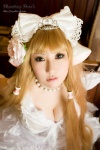 blonde_hair chii_(chobits) chobits cleavage cosplay dress hairbow momoiro_merankori saku rating:Safe score:0 user:nil!