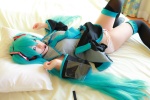 aqua_hair arai_yomi bed blouse cosplay detached_sleeves hatsune_miku headset panties pleated_skirt skirt thighhighs tie twintails vocaloid rating:Safe score:1 user:nil!