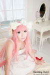 bed cleavage cosplay dress hairband megurine_luka pink_hair saku twintails vocaloid world_is_mine_(vocaloid) rating:Safe score:1 user:nil!