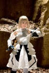 armor blonde_hair boots braid cosplay detached_sleeves dress fate/series fate/stay_night gauntlets kamui_arisa pantyhose red_moon saber sword rating:Safe score:0 user:nil!