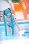 aqua_hair bikini cleavage cosplay hatsune_miku headset inner_tube mashiro_yuki pool project_diva swimsuit twintails vocaloid wet rating:Safe score:1 user:nil!