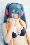aqua_hair bikini_top cosplay ear_muffs hatsune_miku headset momoka_(ii) scarf swimsuit twintails vocaloid rating:Safe score:0 user:pixymisa