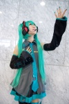 aqua_hair cosplay default_costume hatsune_miku headphones twintails uzuki vocaloid rating:Safe score:0 user:Log
