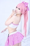 cosplay dai hairbow megurine_luka pink_hair pleated_skirt ponytail skirt tubetop vocaloid rating:Safe score:3 user:pixymisa