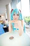 aqua_hair bikini cosplay hatsune_miku headset kishimen project_diva swimsuit twintails vocaloid rating:Safe score:0 user:pixymisa