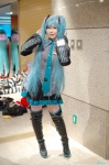 aqua_hair ayata blouse boots cosplay detached_sleeves hatsune_miku headset pleated_skirt skirt thigh_boots thighhighs tie twintails vocaloid zettai_ryouiki rating:Safe score:1 user:nil!