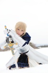 armor blonde_hair blouse braid cosplay fate/series fate/stay_night gauntlets kamui_arisa red_moon saber skirt sword rating:Safe score:0 user:nil!