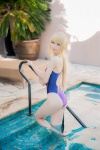 ahoge ass blonde_hair cosplay fate/series fate/stay_night king~earth~ mike one-piece_swimsuit ponytail pool saber swimsuit wet rating:Safe score:3 user:nil!