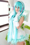 aqua_hair cosplay dress elbow_gloves gloves hatsune_miku head_wings madoka_chami pantyhose project_diva_2nd thighhighs twintails vocaloid wings zettai_ryouiki rating:Safe score:0 user:xkaras