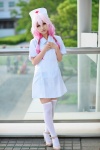 cosplay dress guilty_crown kuuta nurse nurse_cap nurse_uniform pink_hair thighhighs yuzuriha_inori zettai_ryouiki rating:Safe score:3 user:nil!