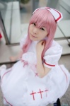 cosplay crosscrossplay dress mashiro_ayaki nurse nurse_cap nurse_uniform pink_hair princess_princess yukata_mikoto rating:Safe score:0 user:nil!