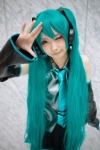 aqua_hair blouse cosplay detached_sleeves hatsune_miku headset mineo_kana pleated_skirt skirt tie twintails vocaloid rating:Safe score:1 user:nil!