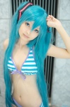 aqua_hair bikini blue_eyes cosplay hair_ribbons hatsune_miku sakuya_mikoto swimsuit twintails vocaloid rating:Safe score:0 user:pixymisa