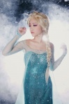 blonde_hair blue_eyes cosplay dress elsa frozen tomiaaaaaaa rating:Safe score:1 user:DarkSSA