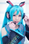 aqua_hair blouse cosplay detached_sleeves hatsune_miku momoneko_haru tie twintails vocaloid rating:Safe score:0 user:pixymisa