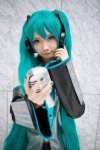 aqua_hair blouse cosplay detached_sleeves hatsune_miku headset microphone mineo_kana pleated_skirt skirt tie twintails vocaloid rating:Safe score:1 user:nil!