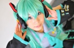 aqua_hair cosplay default_costume detached_sleeves hatsune_miku headset pleated_skirt skirt tenko tie twintails vocaloid rating:Safe score:0 user:nil!