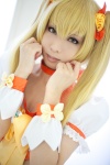 blonde_hair bows choker cosplay croptop cuffs cure_sunshine flowers hairbows heartcatch_precure! kanda_midori myoudouin_itsuki pretty_cure twintails rating:Safe score:1 user:pixymisa