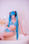 aqua_hair bathroom bathtub bikini cleavage cosplay hatsune_miku headset mashiro_yuki project_diva swimsuit twintails vocaloid rating:Safe score:0 user:nil!