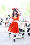 blouse cosplay detached_sleeves hairbow hakurei_reimu miko skirt socks touhou you_(ii) rating:Safe score:1 user:nil!