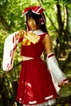 blouse cosplay detached_sleeves hairbow hakurei_reimu matsunaga_ayaka miko skirt touhou rating:Safe score:0 user:nil!