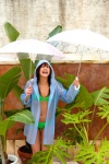 bikini i_love_vacation nagasaki_rina raincoat swimsuit twin_braids umbrella rating:Safe score:0 user:nil!