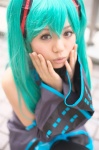 aqua_hair cosplay default_costume detached_sleeves hatsune_miku headset pleated_skirt skirt thighhighs tie twintails vocaloid yaya rating:Safe score:0 user:nil!