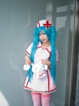 aqua_hair chii cosplay hatsune_miku koiiro_byoutou_(vocaloid) nurse nurse_cap nurse_uniform thighhighs twintails vocaloid zettai_ryouiki rating:Safe score:2 user:xkaras