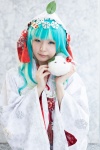 aqua_eyes cosplay hatsune_miku hood maitako multi-colored_hair plushie robe tassels vocaloid rating:Safe score:0 user:pixymisa