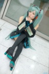 aqua_hair blouse cosplay detached_sleeves hatsune_miku headset maitako pleated_skirt skirt thighhighs tie twintails vocaloid rating:Safe score:3 user:pixymisa