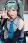 aqua_hair blouse cosplay detached_sleeves hatsune_miku headset maitako pleated_skirt skirt tie twintails vocaloid rating:Safe score:0 user:pixymisa